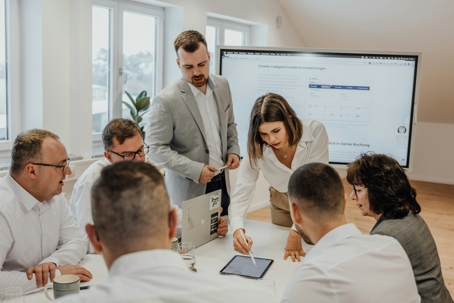 Business people gathered at a table during a meeting